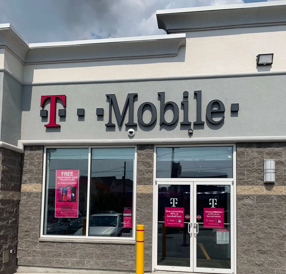 Exterior photo of T-Mobile store at Dexter St & Cross St, Central Falls, RI