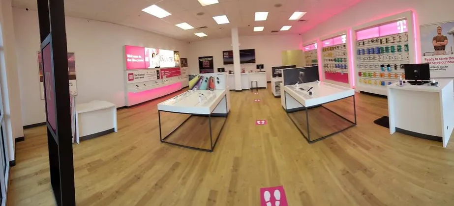 Interior photo of T-Mobile Store at Business Cir & Market St, Naples, FL