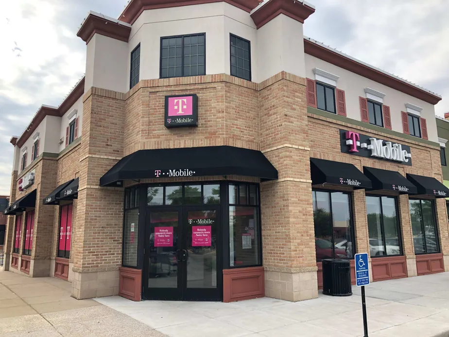 Exterior photo of T-Mobile store at Elm Creek Blvd & Main St, Maple Grove, MN