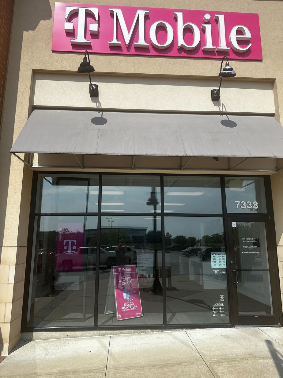 Exterior photo of T-Mobile Store at S Olympia Ave & Town Center Dr, Tulsa, OK
