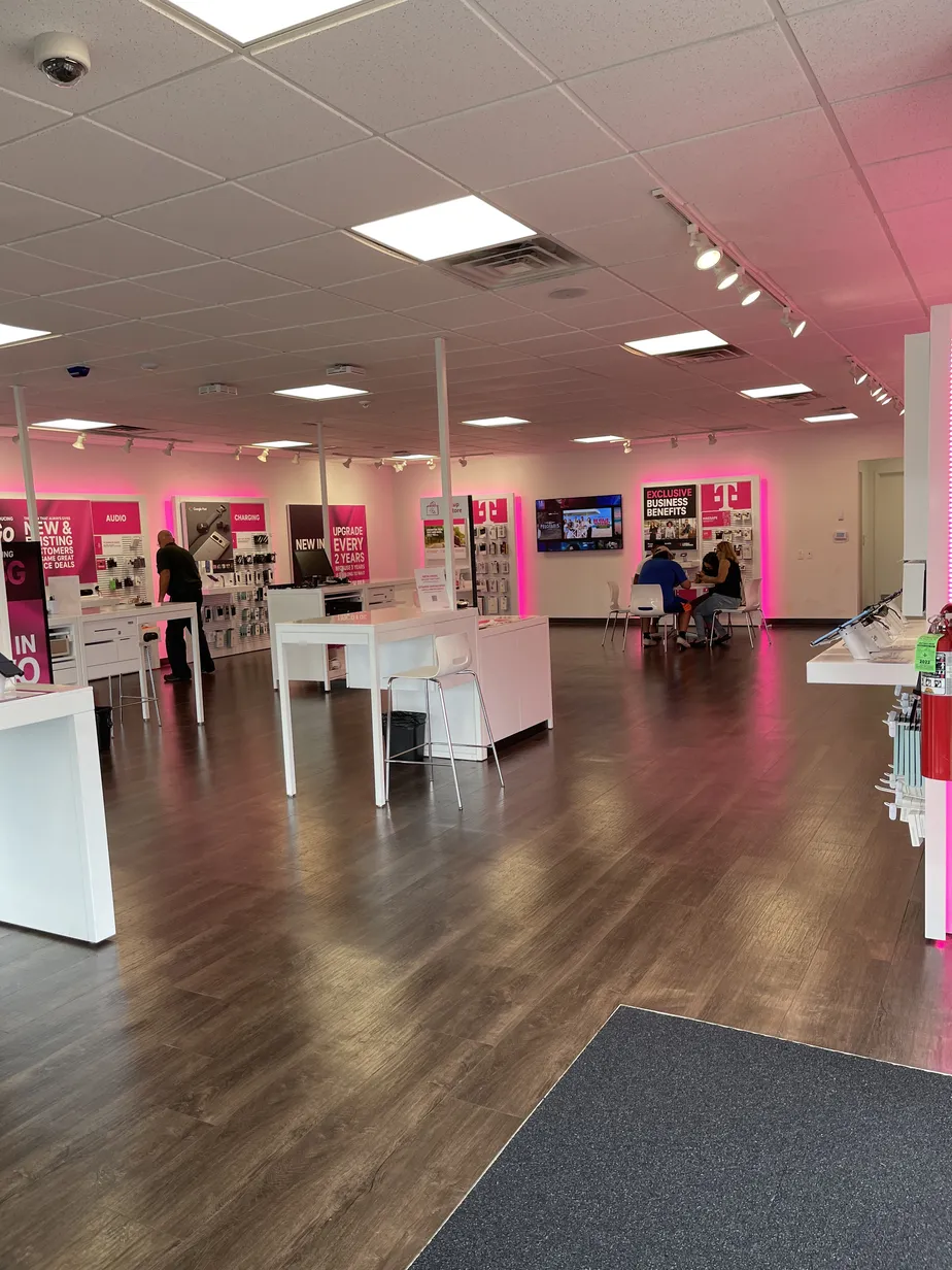 Interior photo of T-Mobile Store at E State St & Mid America Dr, Rockford, IL