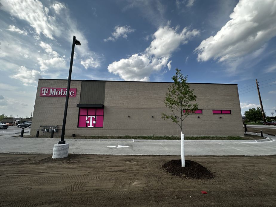 Exterior photo of T-Mobile Store at Edgewood Rd & Town Centre Way, Cedar Rapids, IA