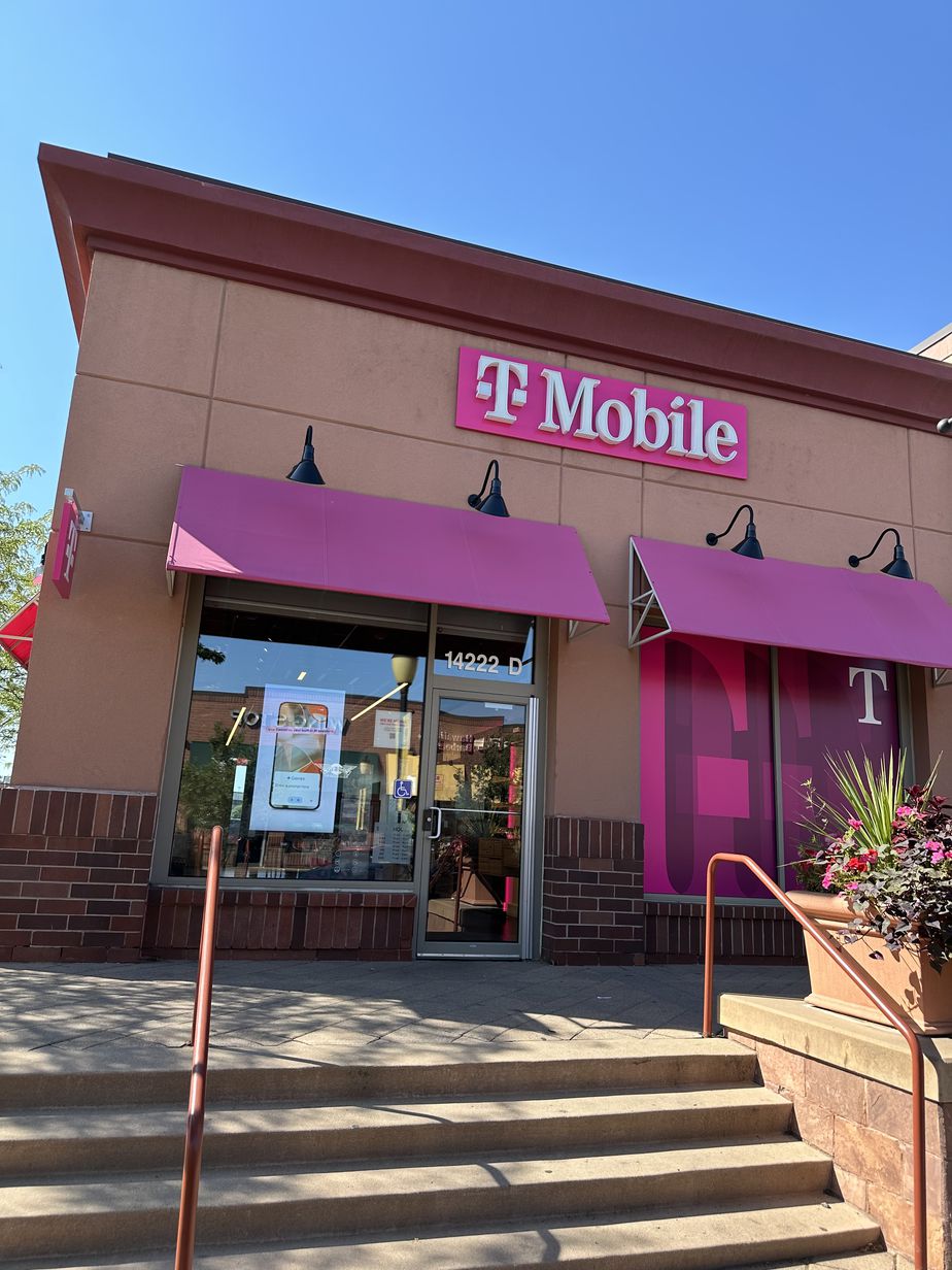 Exterior photo of T-Mobile Store at E Cedar Ave & Crystal St, Aurora, CO