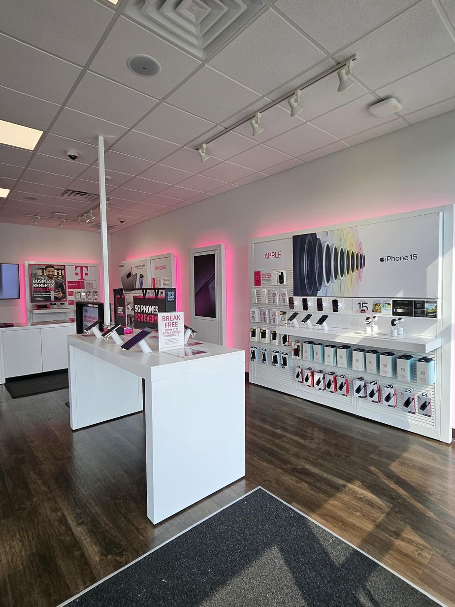 Interior photo of T-Mobile Store at W Jesse James Rd & Corum Rd, Excelsior Springs, MO