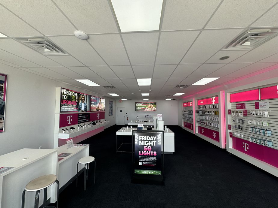 Interior photo of T-Mobile Store at N Texas Ave & San Jacinto Ln, Bryan, TX