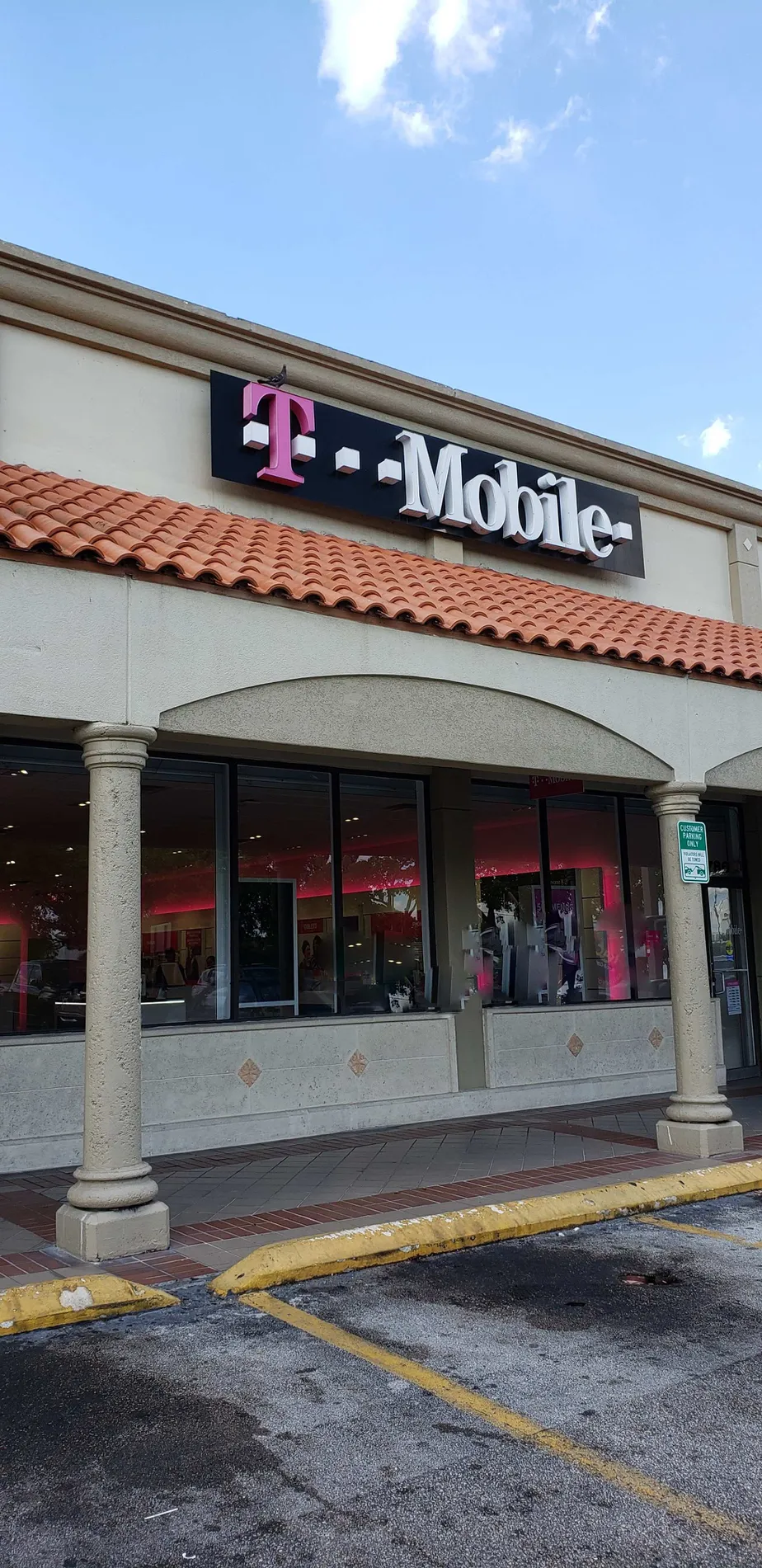Exterior photo of T-Mobile store at W 68th & W 16th Ave, Hialeah, FL