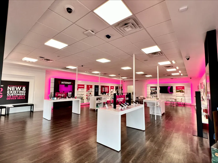 Interior photo of T-Mobile Store at Hwy 59 N & E Denton, Humble, TX