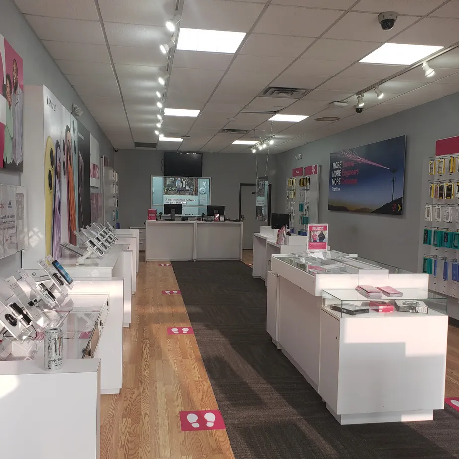  Interior photo of T-Mobile Store at Milford Rd & Lyon Center Dr E, New Hudson, MI 