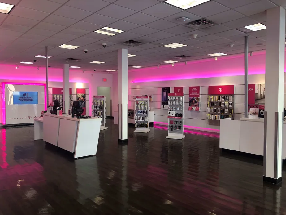 Interior photo of T-Mobile Store at Red Rd & Sunset Dr, Miami, FL