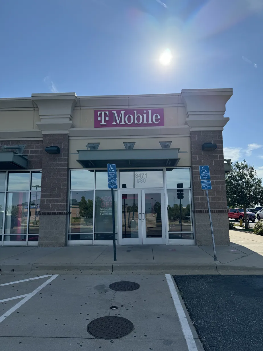  Exterior photo of T-Mobile Store at I-70 & Tower Rd, Aurora, CO 
