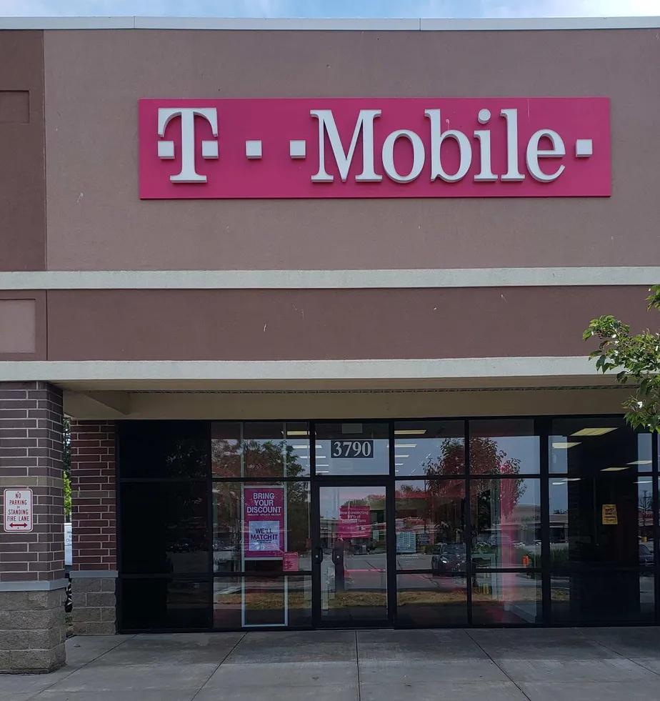 Exterior photo of T-Mobile store at Dewey Ave & English Rd, Greece, NY