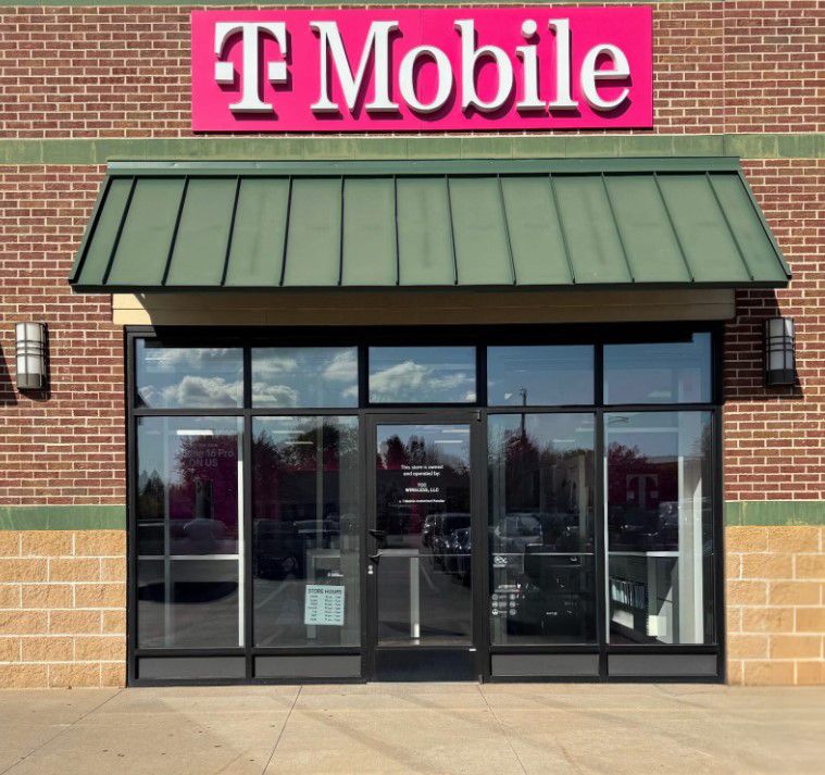 Exterior photo of T-Mobile Store at E Riverside Blvd & Sinkiawic Pkwy, Loves Park, IL