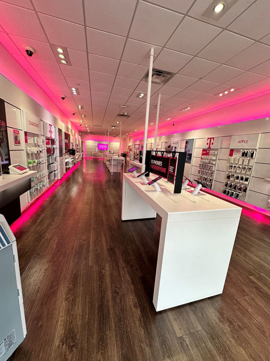 Interior photo of T-Mobile Store at Broadway & Steinway St, Astoria, NY