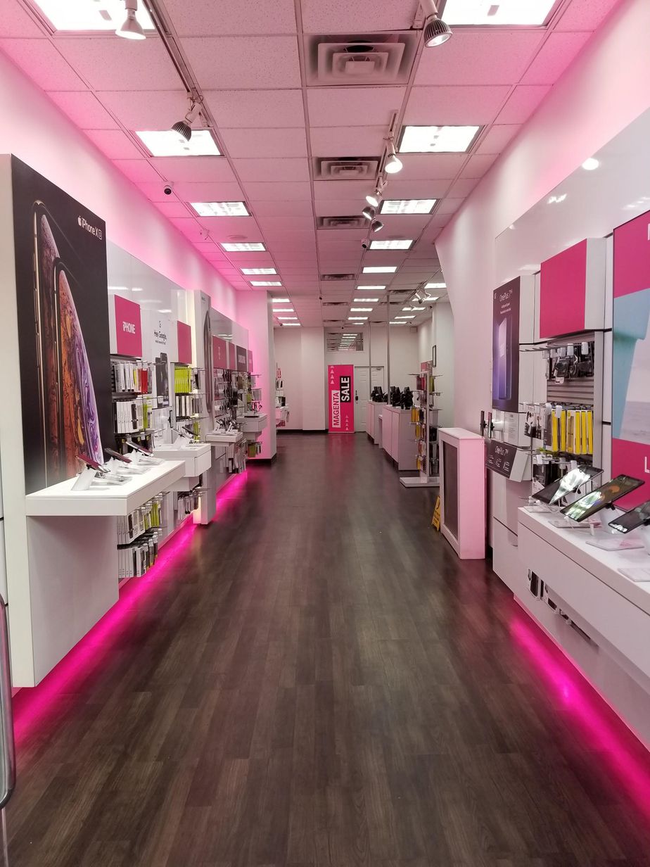 Interior photo of T-Mobile Store at E 116th St & 3rd Ave, New York, NY