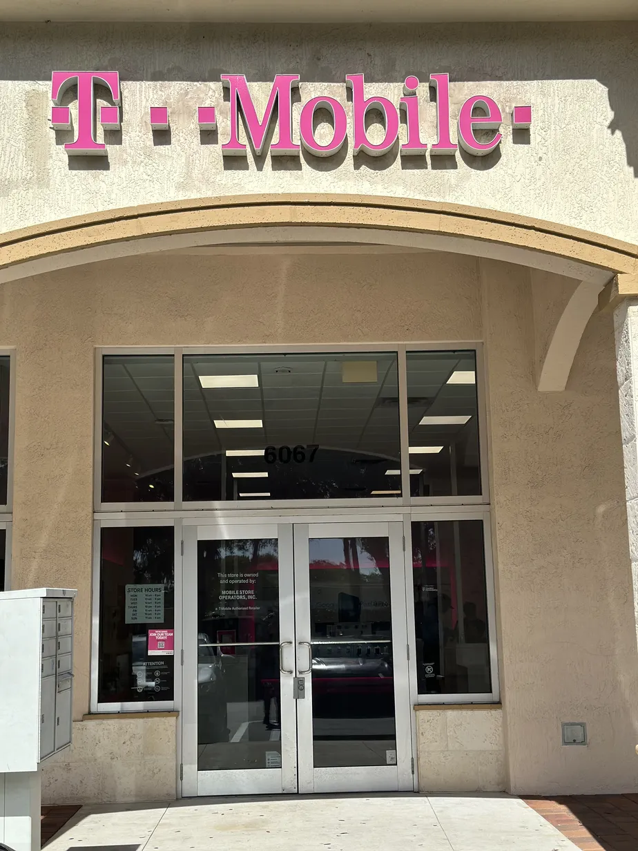  Exterior photo of T-Mobile Store at Coral Ridge Dr & Holmberg Rd, Coral Springs, FL 