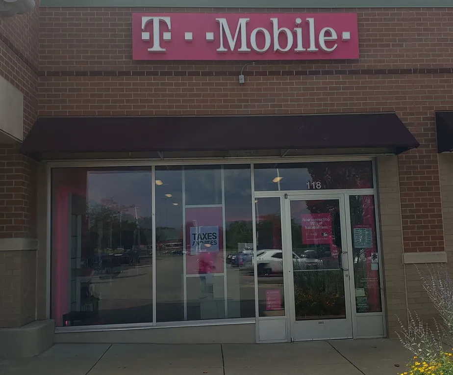 Exterior photo of T-Mobile store at E Beltline Ave & Knapp St, Grand Rapids, MI