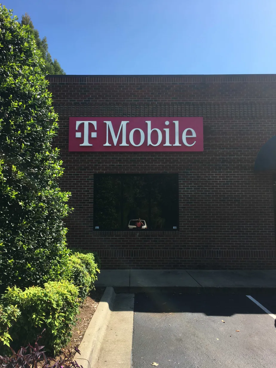 Exterior photo of T-Mobile store at S Main St & Alberbury Commons Ct, Wake Forest, NC