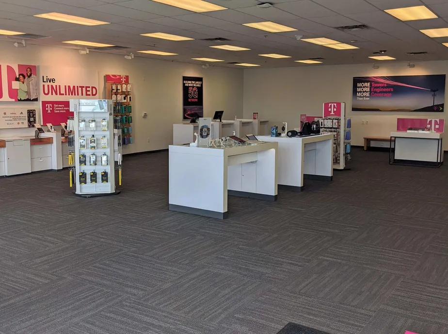Interior photo of T-Mobile Store at Cpl Max Donahue Ln & Sgt Jon Stiles Dr, Highlands Ranch, CO