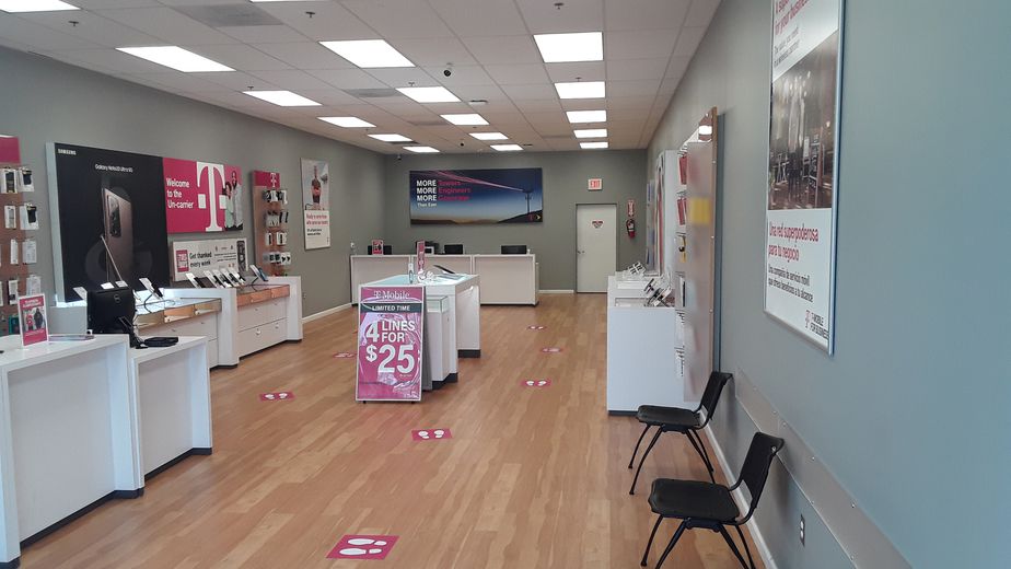Interior photo of T-Mobile Store at Hilltop Village Center, Alexandria, VA