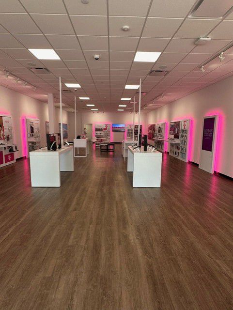 Interior photo of T-Mobile Store at Sunrise Hwy & Johnson Ave, Bohemia, NY