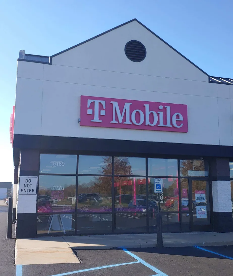 Exterior photo of T-Mobile store at Harvey St & Independence Dr, Norton Shores, MI