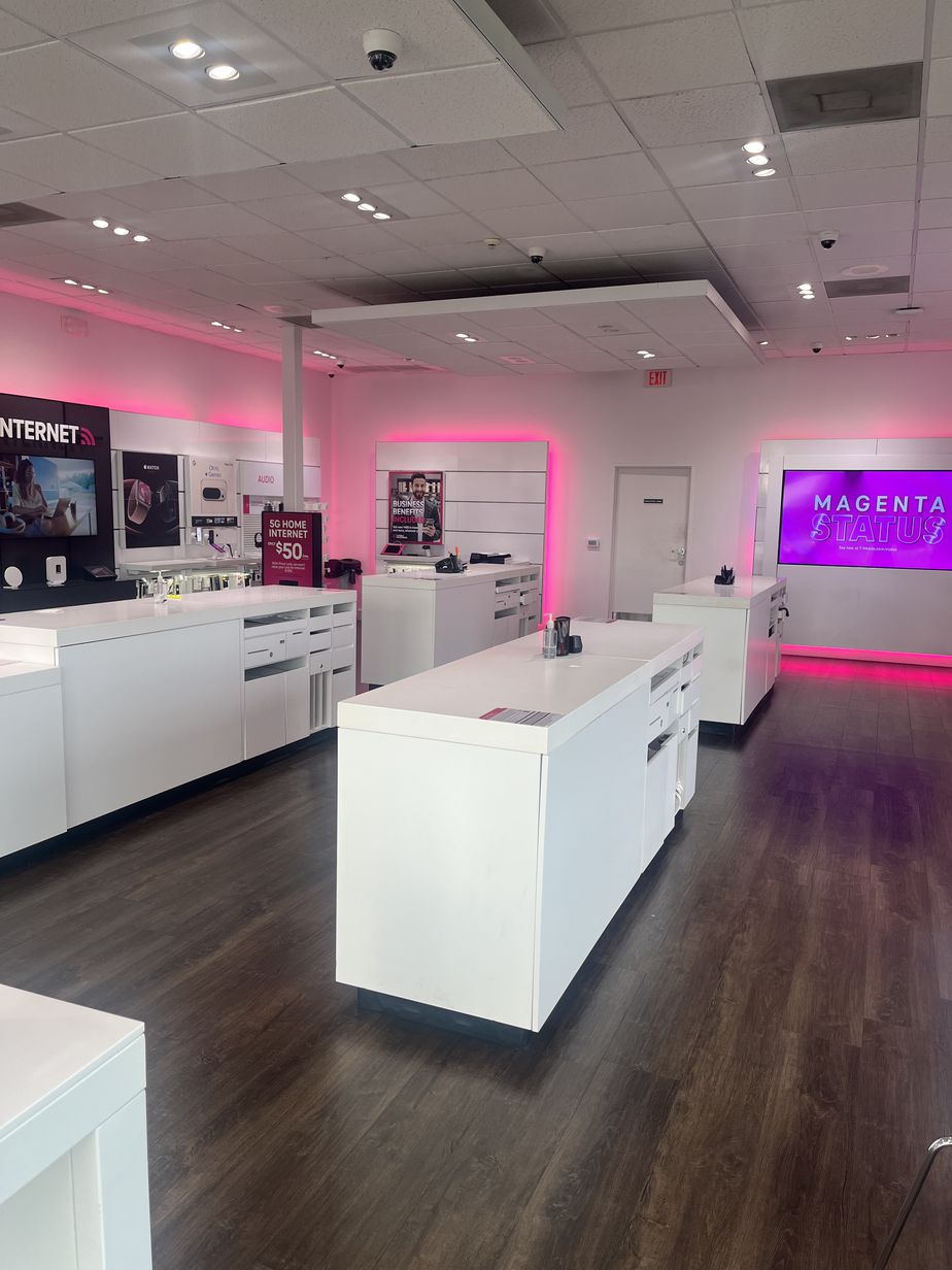 Interior photo of T-Mobile Store at The Shops at Royal Oaks, Houston, TX