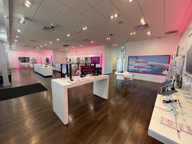 Interior photo of T-Mobile Store at Pico & San Vicente, Los Angeles, CA