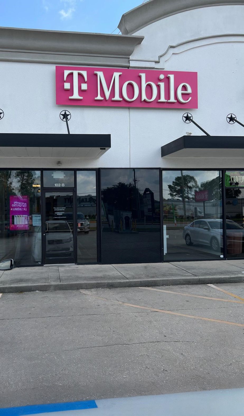 Exterior photo of T-Mobile Store at Sawdust Rd & Borough Park Dr, Spring, TX