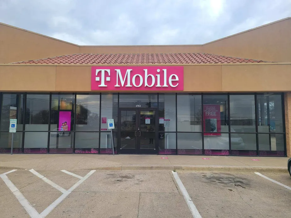 Exterior photo of T-Mobile store at W Camp Wisdom Rd & Red Bird Ctr, Dallas, TX