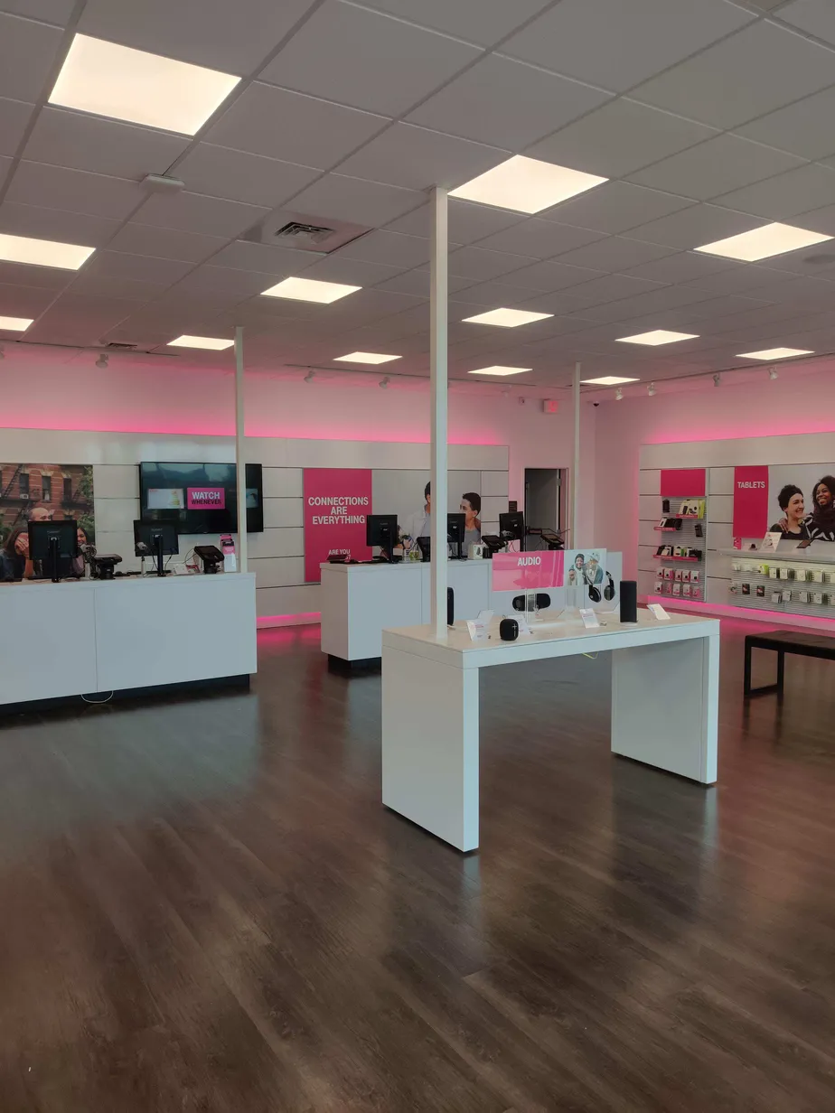 Interior photo of T-Mobile Store at E Oak St & Museum Rd, Conway, AR