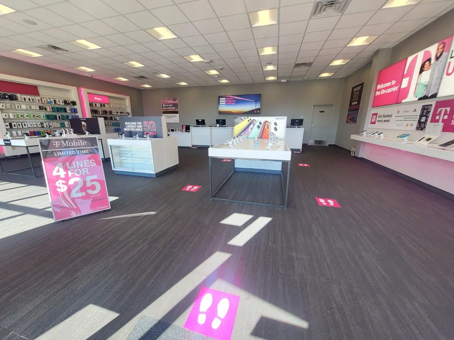  Interior photo of T-Mobile Store at N Rock Rd & E Tall Tree Rd, Derby, KS 