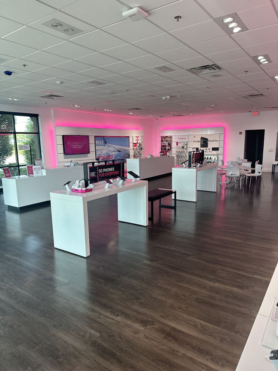 Interior photo of T-Mobile Store at 151st St & Black Bob Rd, Olathe, KS