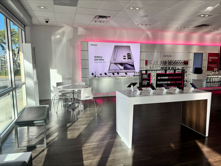 Interior photo of T-Mobile Store at W 49th St & W 8th Ave, Hialeah, FL