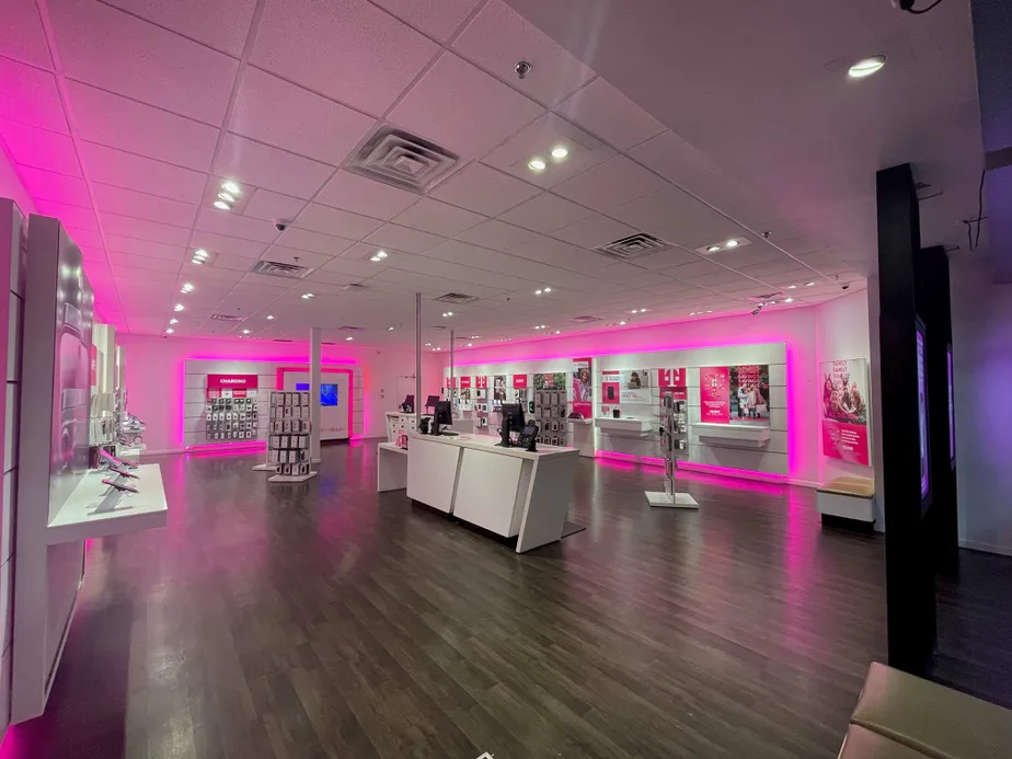 Interior photo of T-Mobile Store at James L Redman Pkwy & E Alexander St, Plant City, FL