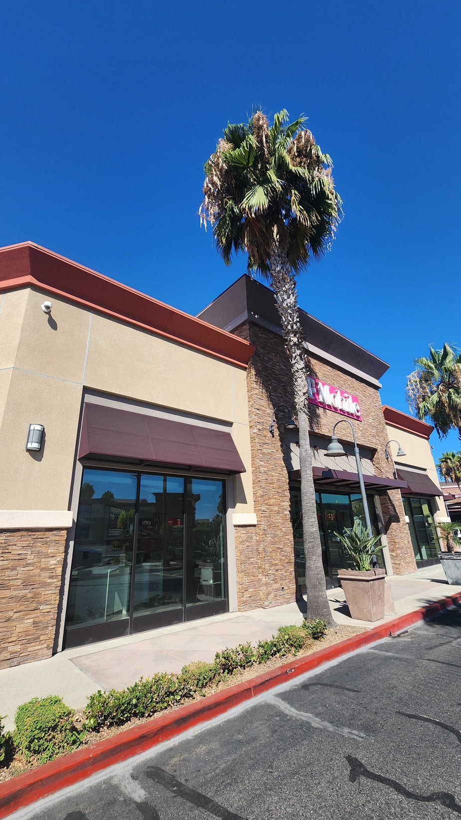 Exterior photo of T-Mobile Store at Beach & Dallas, Buena Park, CA