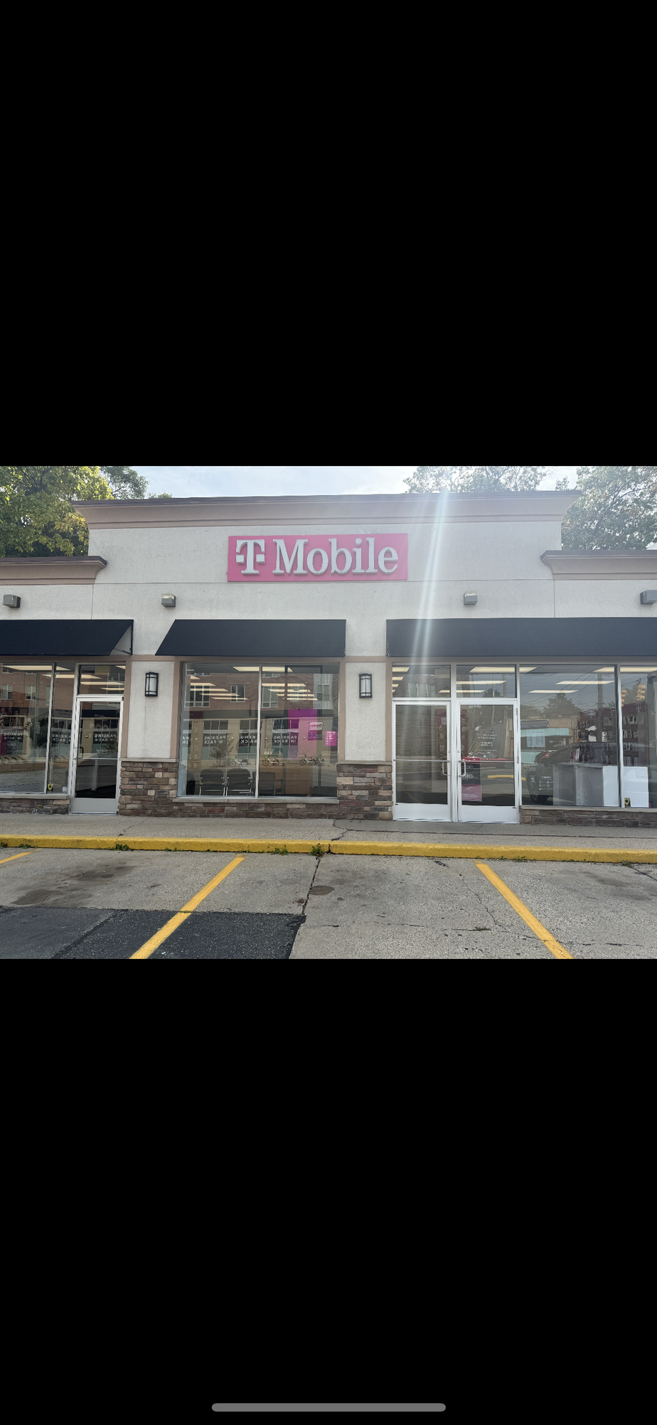 Exterior photo of T-Mobile Store at Michigan St NE & Diamond Ave, Grand Rapids, MI