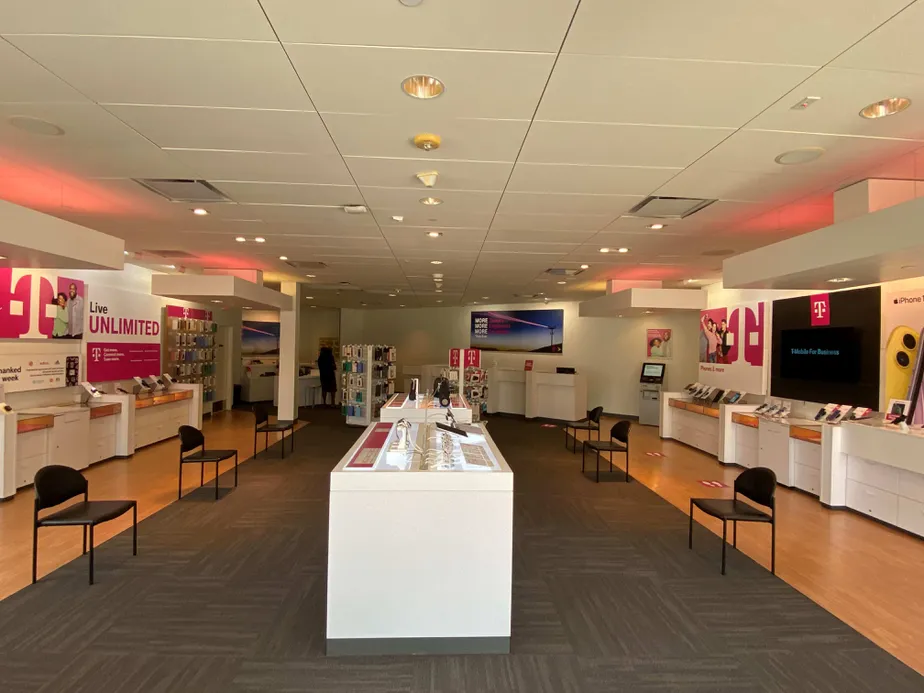 Interior photo of T-Mobile Store at Hwy 6 & Prudential Cir, Sugar Land, TX
