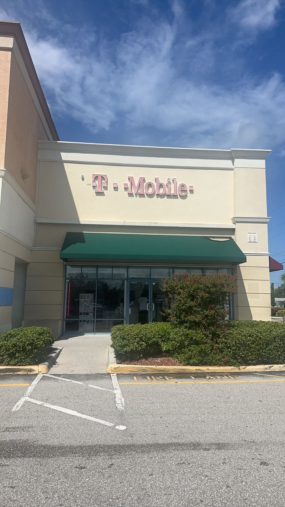 Exterior photo of T-Mobile Store at S Congress & 10 Ave N, Palm Springs, FL