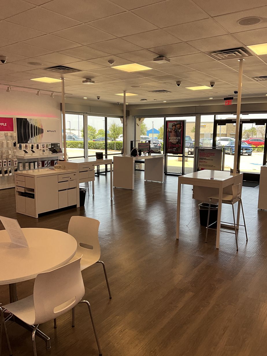 Interior photo of T-Mobile Store at W Main St & S Edmonds Ln, Lewisville, TX