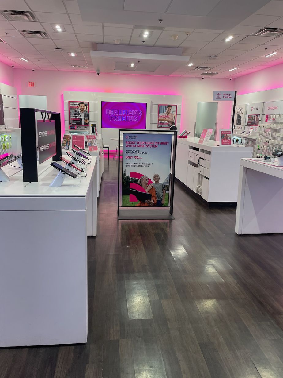 Interior photo of T-Mobile Store at Wilshire Blvd & Vermont, Los Angeles, CA
