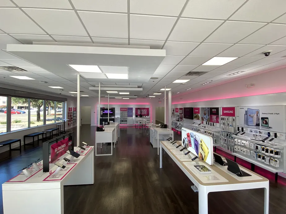 Interior photo of T-Mobile Store at Macarthur & Kinwest Pkwy, Irving, TX