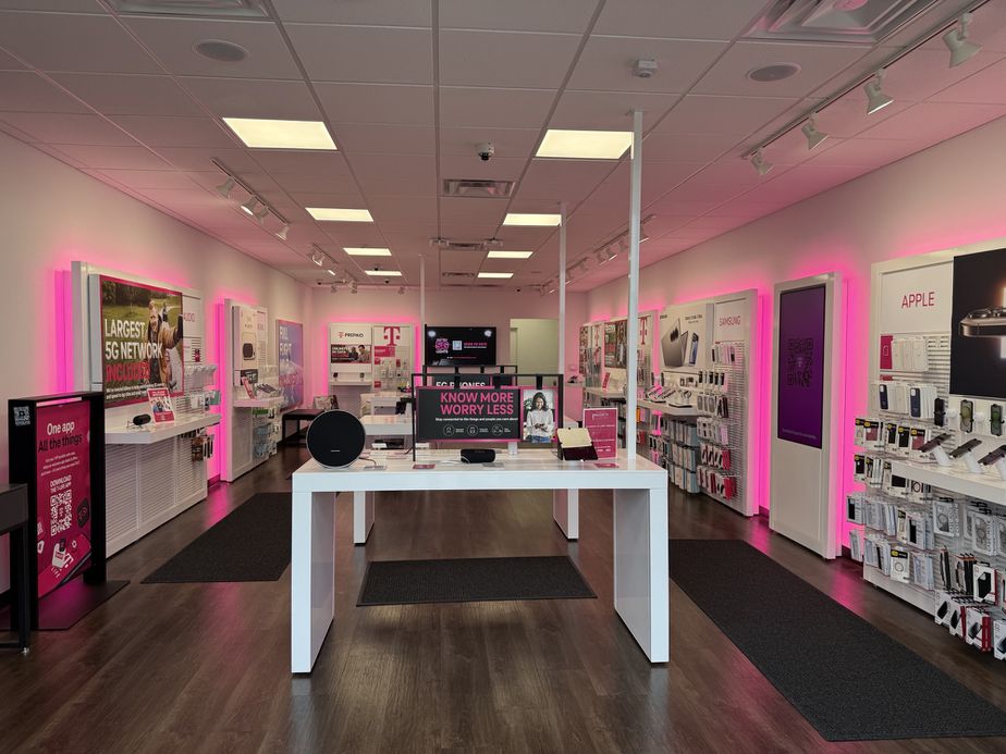 Interior photo of T-Mobile Store at Hill & Torrey, Flint, MI