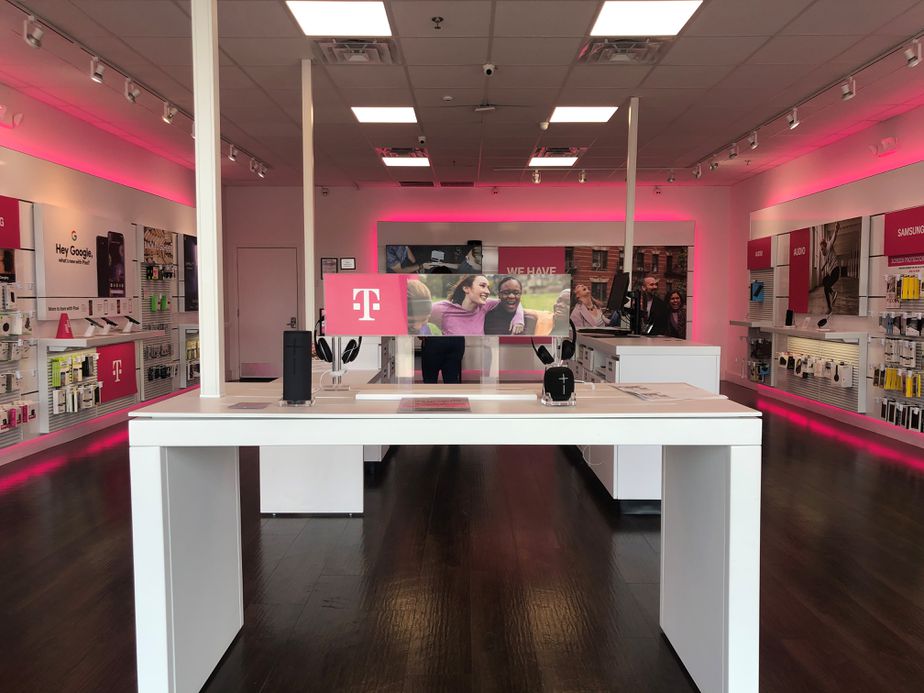 Interior photo of T-Mobile Store at Fm 1960 & Treaschwig Rd, Houston, TX