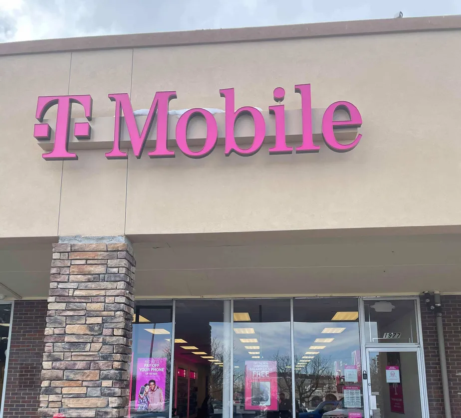 Exterior photo of T-Mobile store at S Federal Blvd & W Asbury Ave, Denver, CO