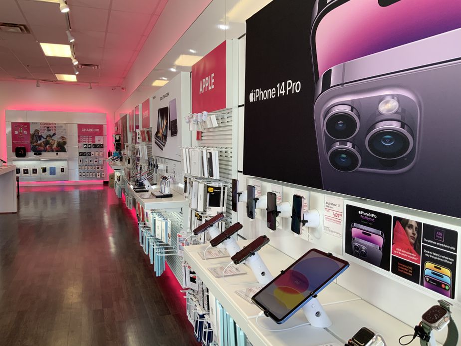 Interior photo of T-Mobile Store at Highland Rd & Fisk, White Lake, MI