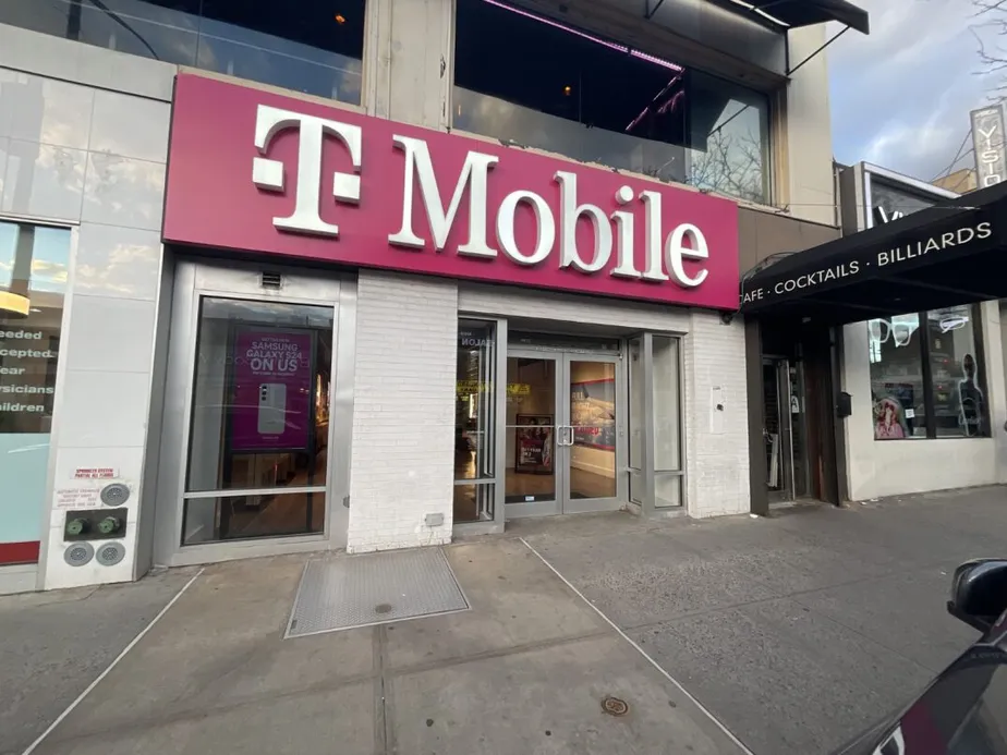  Exterior photo of T-Mobile Store at Austin St & Continental Ave, Forest Hills, NY 