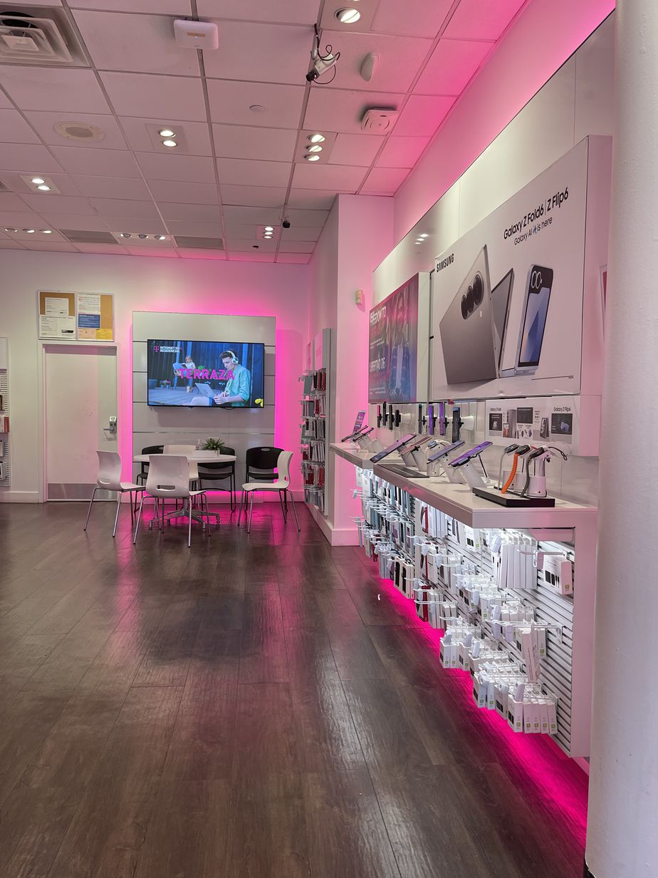Interior photo of T-Mobile Store at E Fordham Rd & Kingsbridge Rd, Bronx, NY