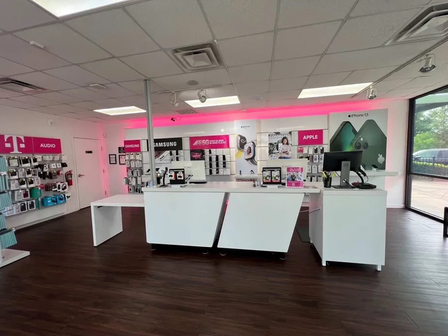 Interior photo of T-Mobile Store at E Hebron Pkwy & Medical Pkwy, Carrollton, TX