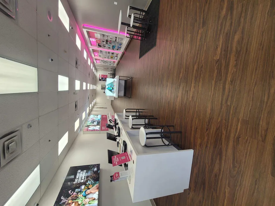 Interior photo of T-Mobile Store at Dallas Pkwy & Communications Pkwy, Plano, TX