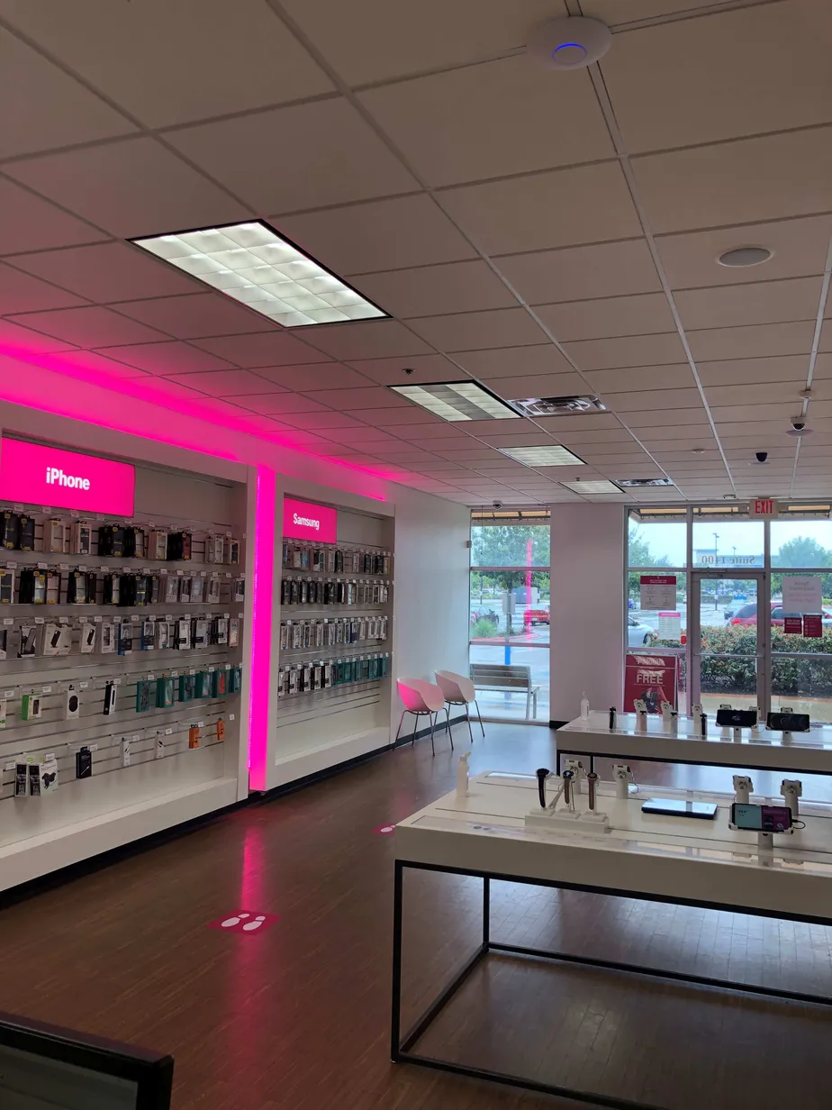 Interior photo of T-Mobile Store at Barbara Jordan Blvd & Lancaster Dr, Austin, TX